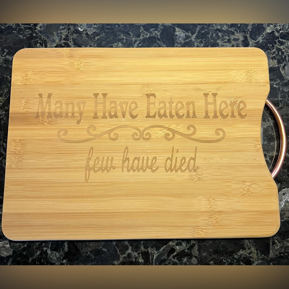 Bamboo Cutting Board “Many Have Eaten Here Few Have Died”